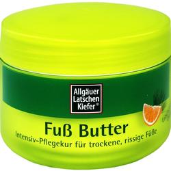 Grüne Dose mit Fußbutter für trockene, rissige Füße.